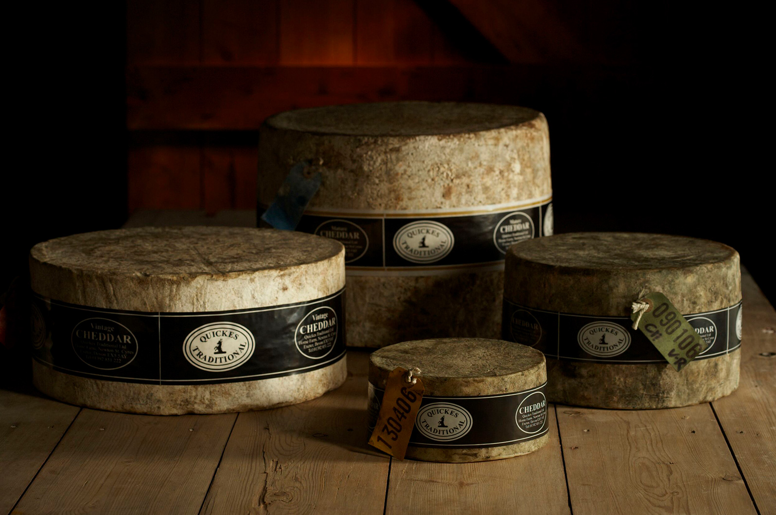 This studio shot is lit to convey the aged and crafted character of the cheese.