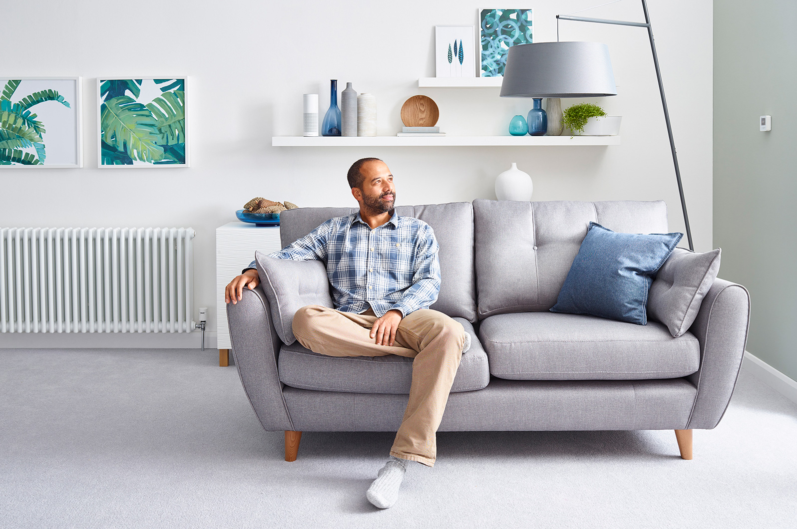 Studio image to convey how the thermostat blends into a room. Set lit to be light and fresh.