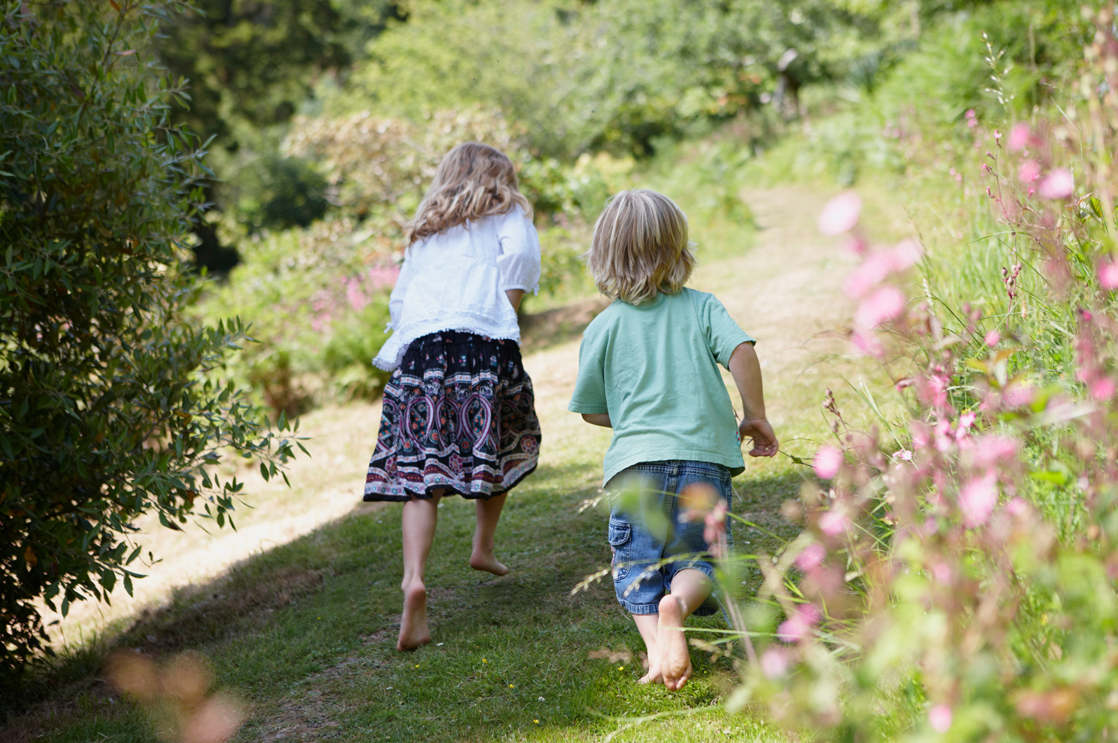 Location lifestyle images of families enjoying their garden.